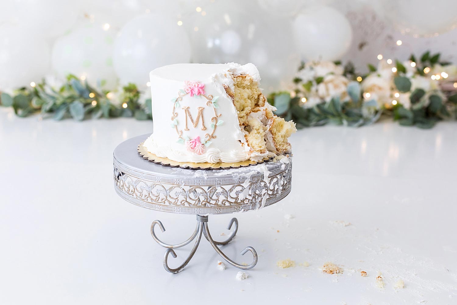 Pink Gold and White monogramed smashed cake 