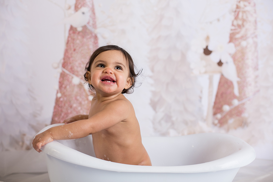 Little girl taking a bath