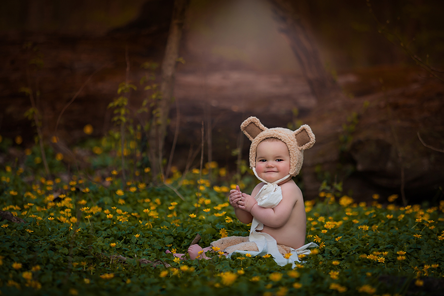 Little kid with teddy bear ears on