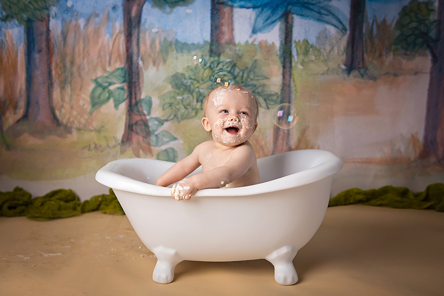 Little boy taking a bath